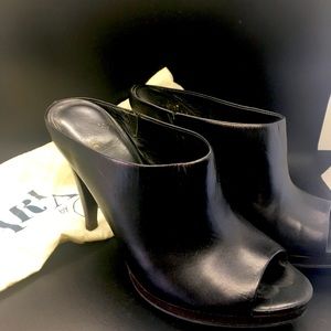 Cole Haan slide heels w grip soles. Amazingly comfortable.